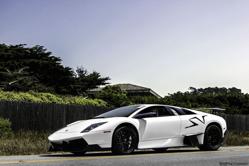 White Lamborghini on coastal road