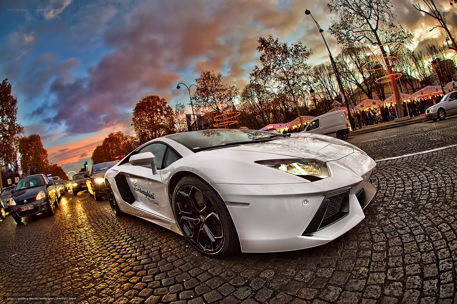 White Lamborghini on cobblestone street