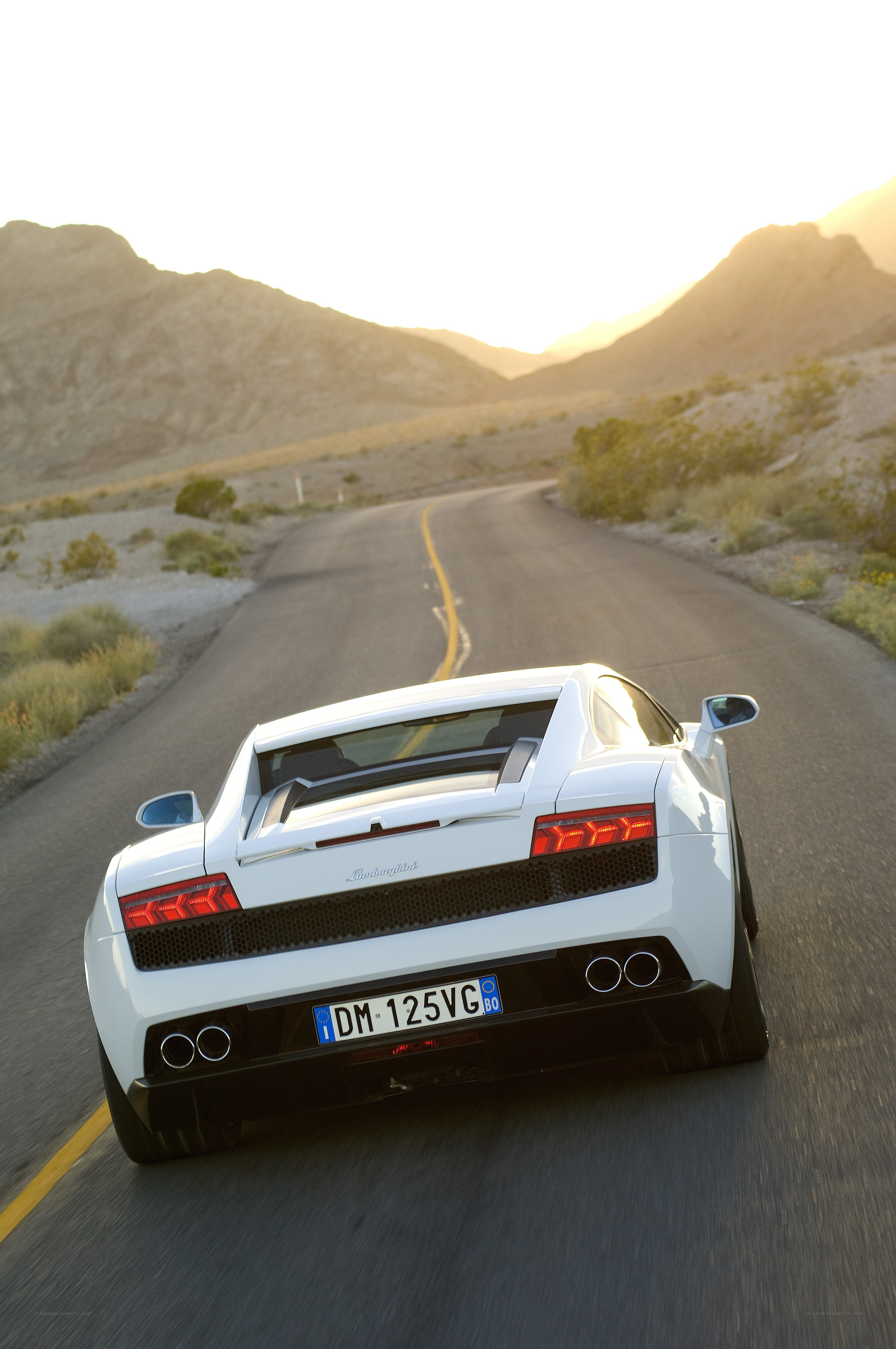 White Lamborghini on desert road