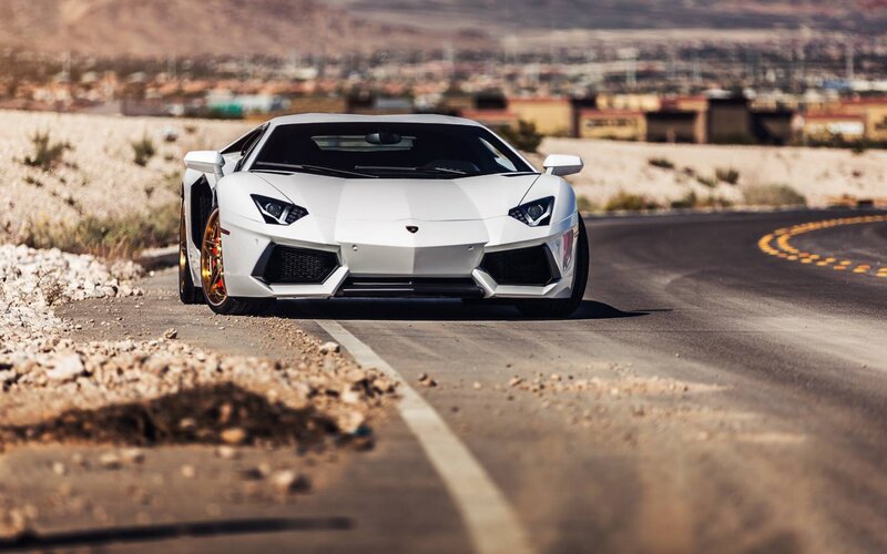 White Lamborghini on desert road