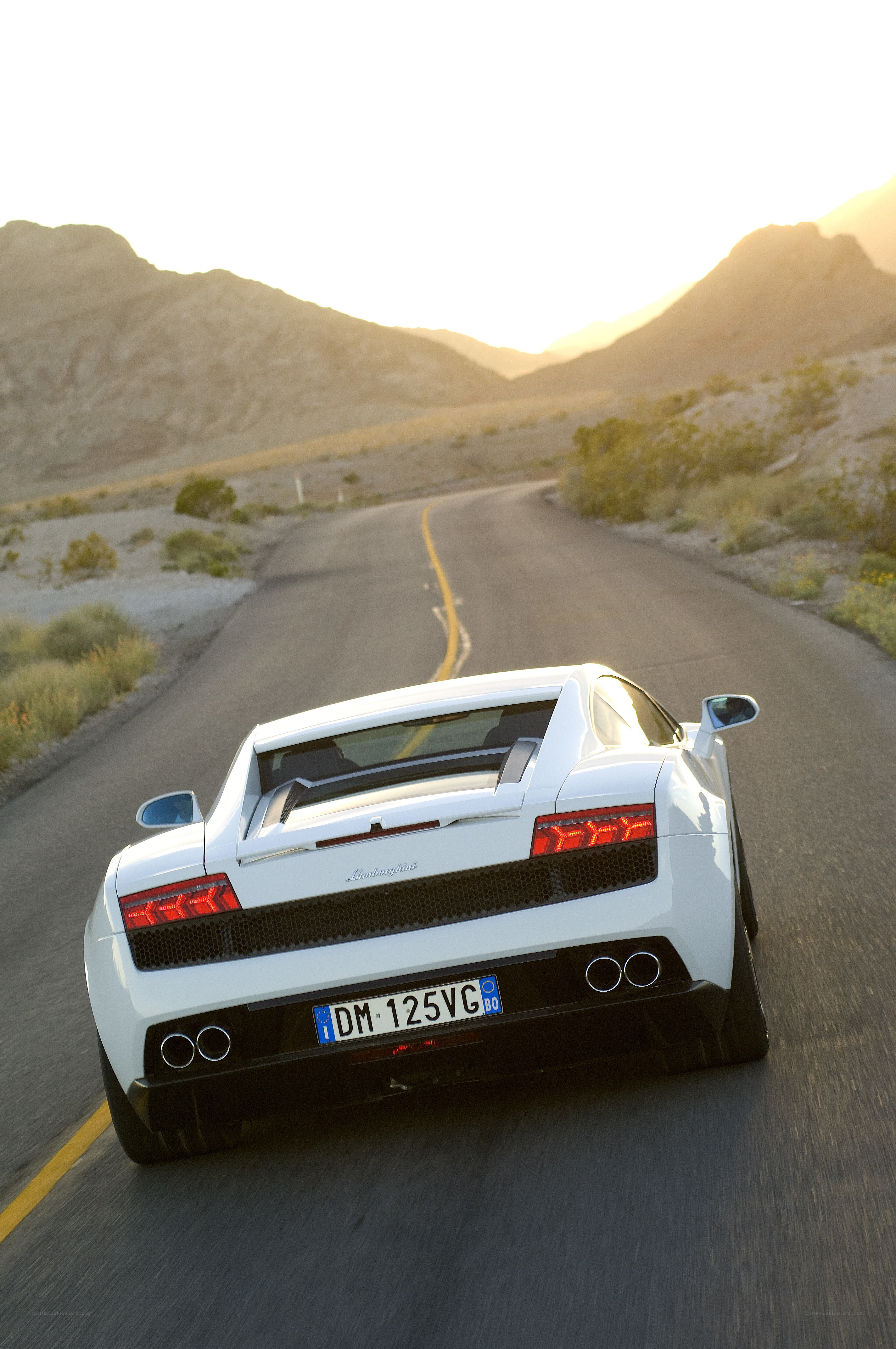 White Lamborghini on desert road