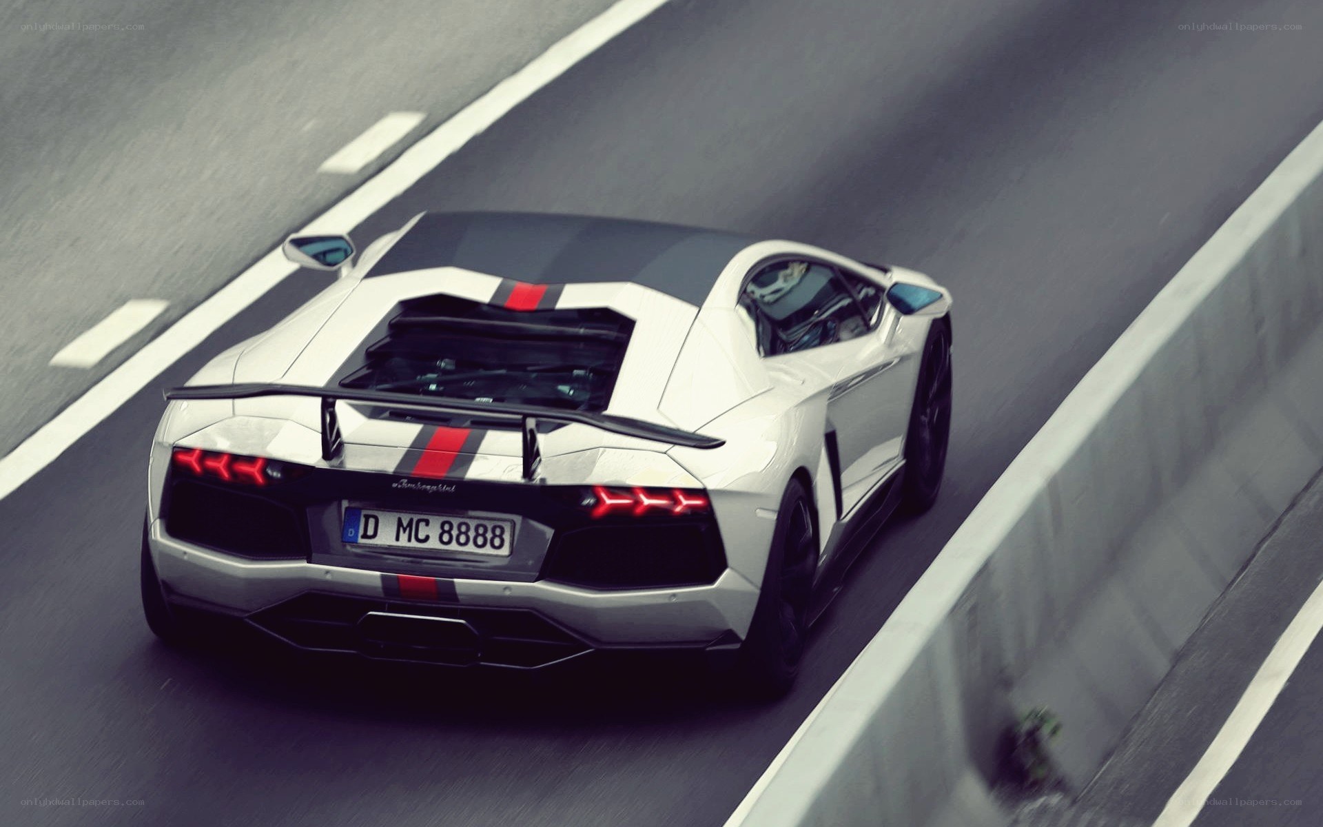 white lamborghini on racetrack