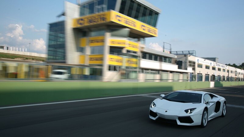 White Lamborghini on racetrack