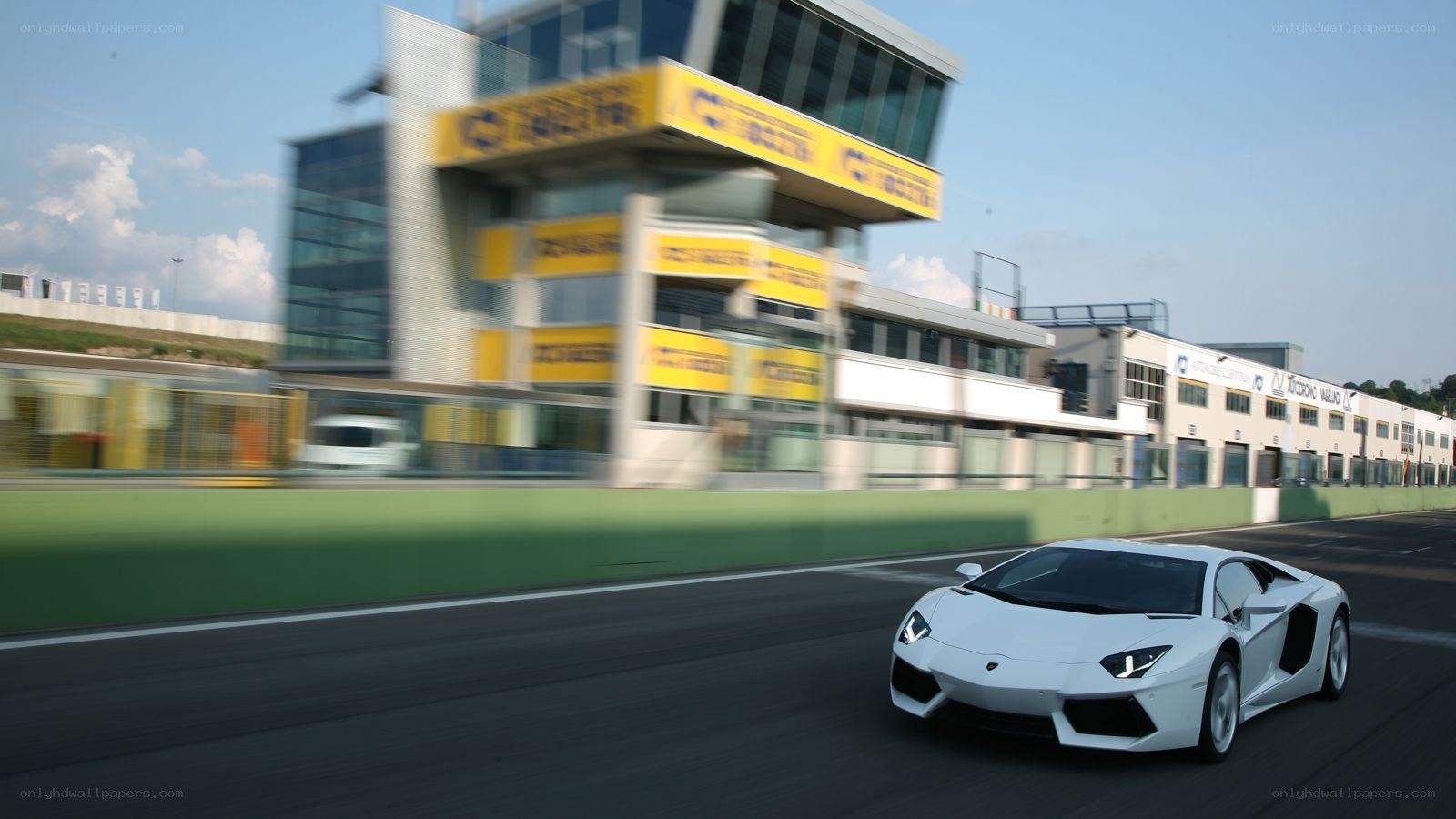 White Lamborghini on racetrack