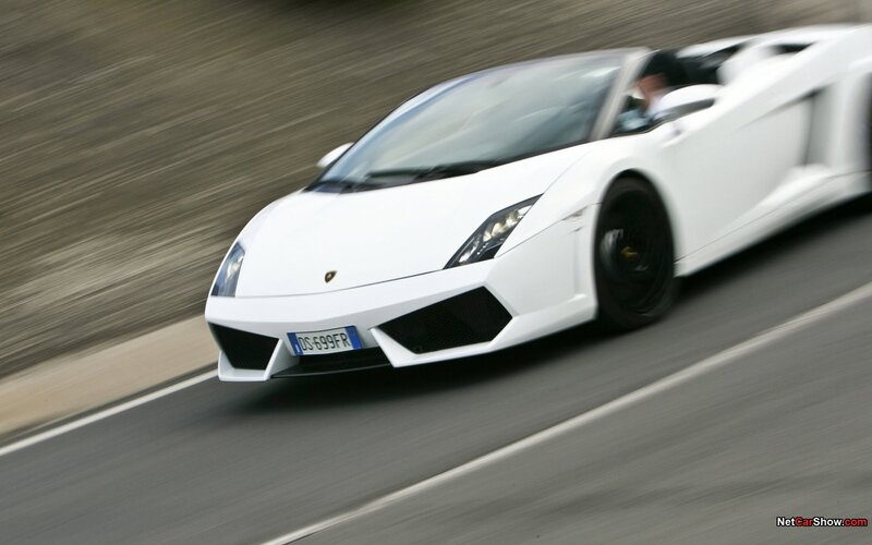 white lamborghini on track