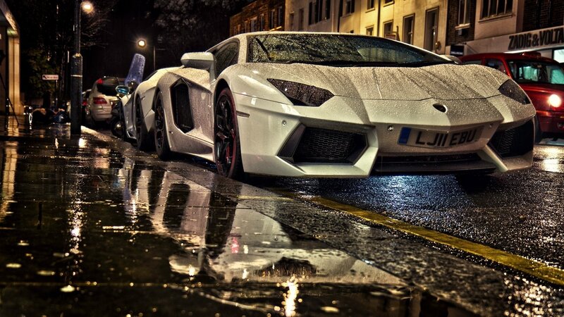 White Lamborghini on Wet Street — Black