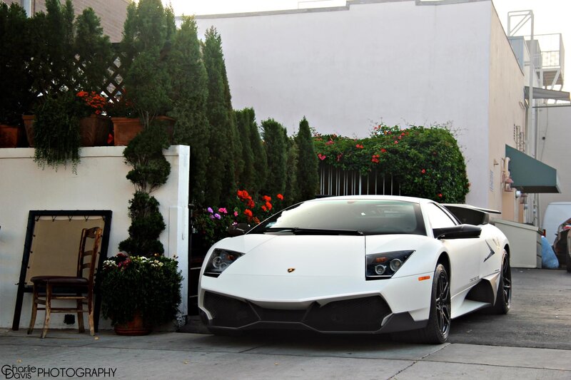 White Lamborghini parked in alley