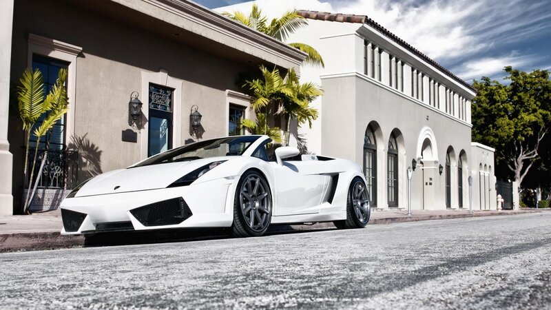 White Lamborghini parked on street