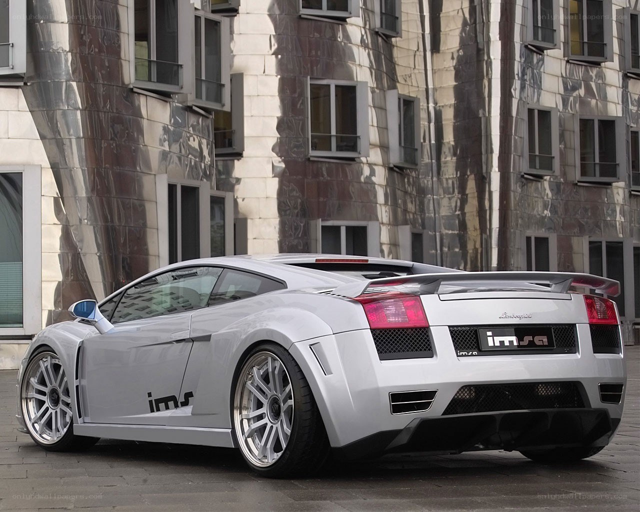 white lamborghini sports car