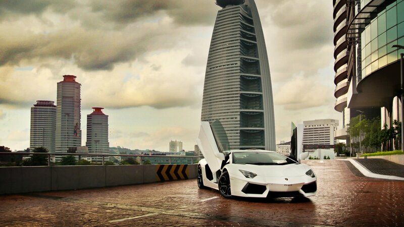 White Lamborghini Sports Car — Dramatic, Afternoon, Photograph, Skyscrapers