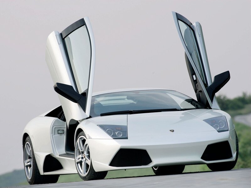 White Lamborghini Sports Car — Dramatic, Photograph, Open Doors