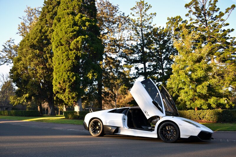 White Lamborghini with doors open