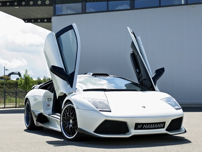 White Lamborghini with doors open