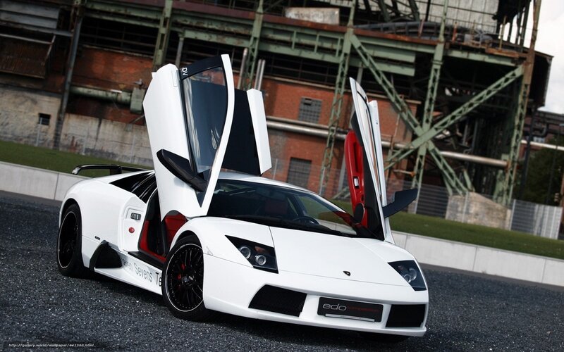 White Lamborghini with doors open