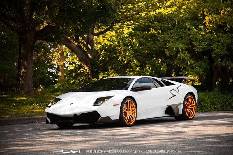 White Lamborghini with gold wheels