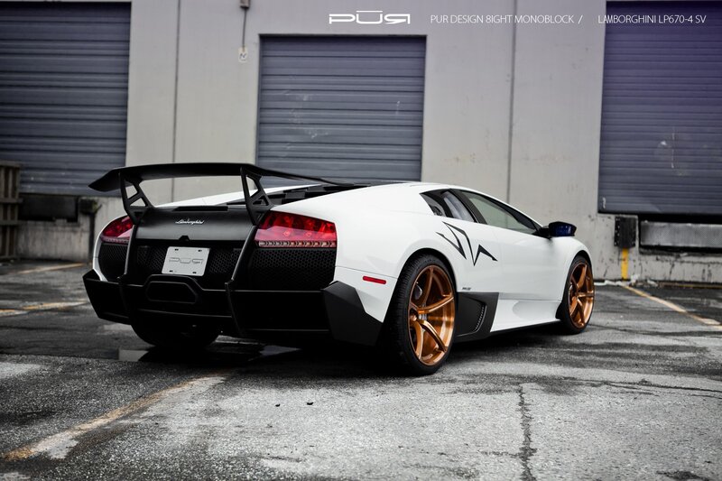 White Lamborghini with gold wheels