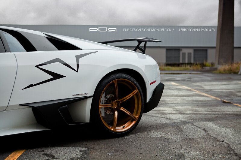 White Lamborghini with gold wheels