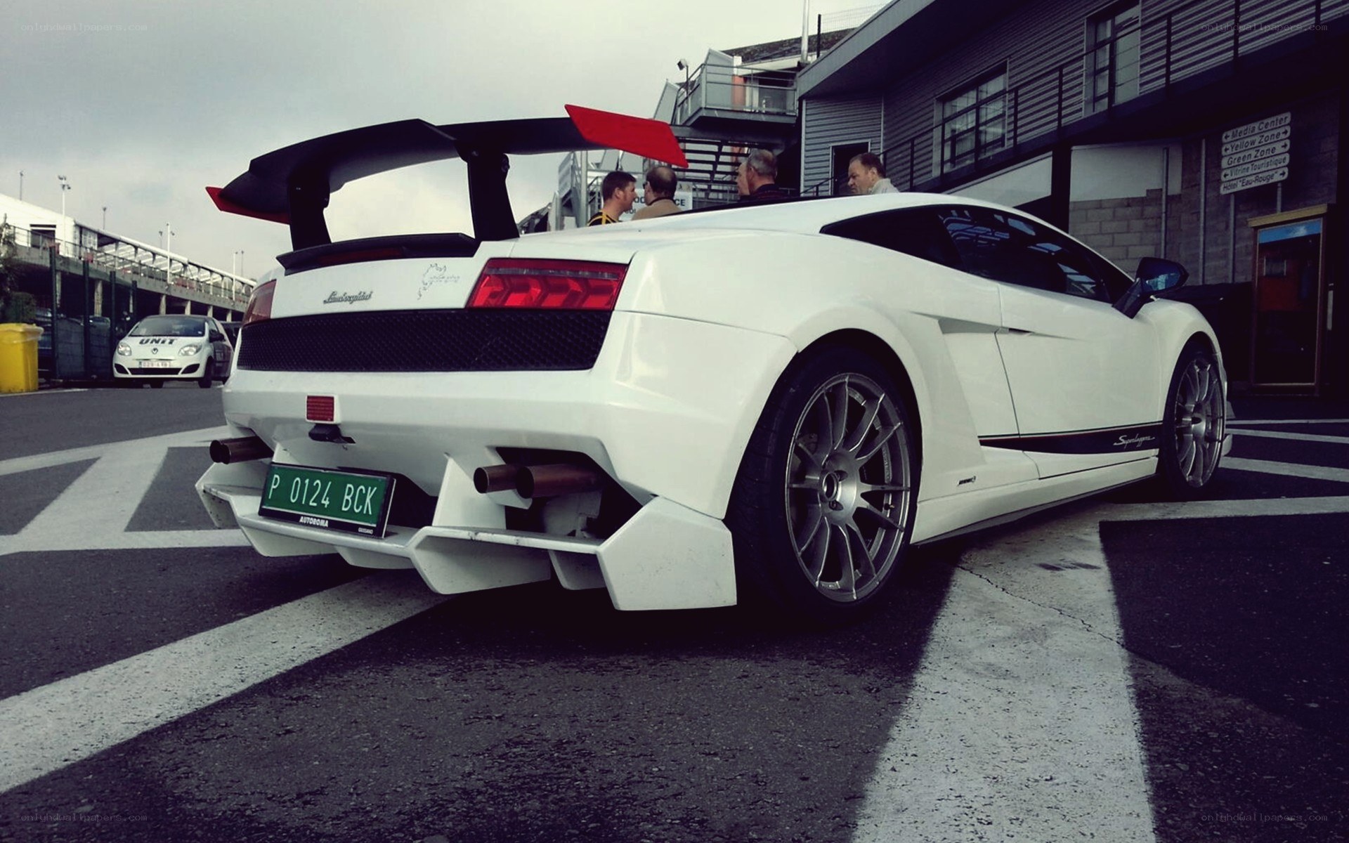 White Lamborghini with large rear wing