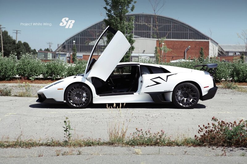 White Lamborghini with open door