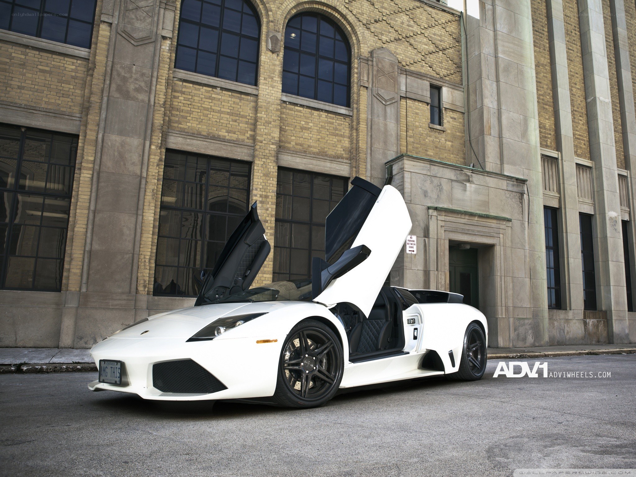 White Lamborghini with open doors