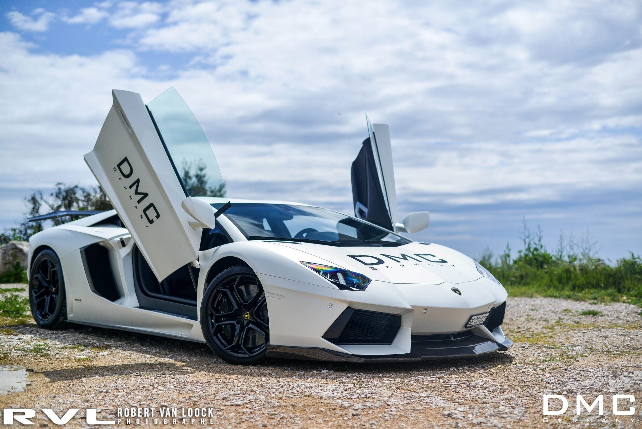 White Lamborghini with open doors
