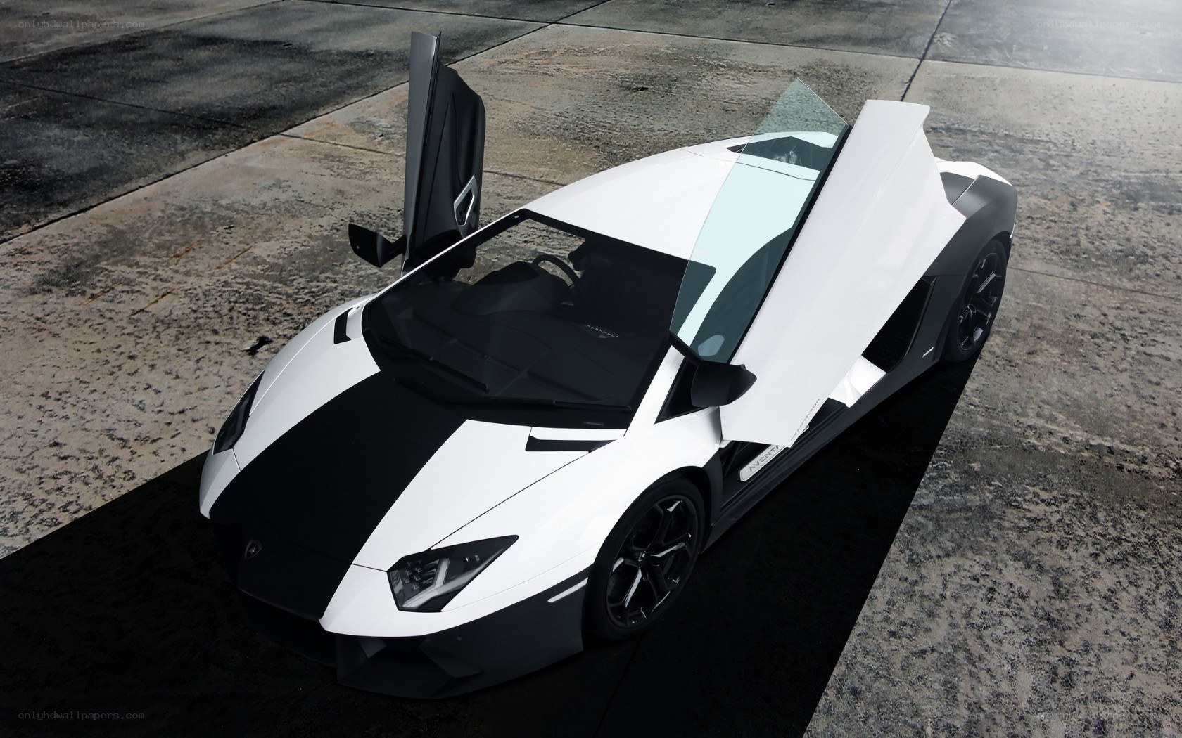 White Lamborghini with open doors