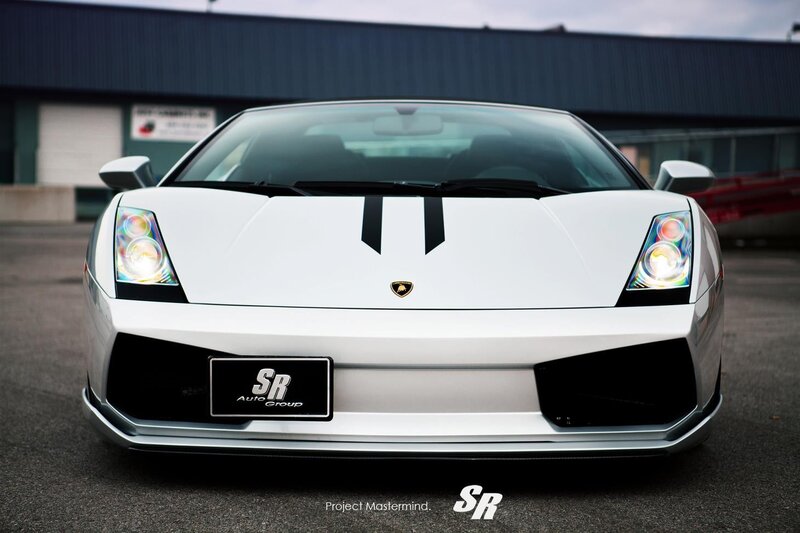 White Lamborghini with racing stripes