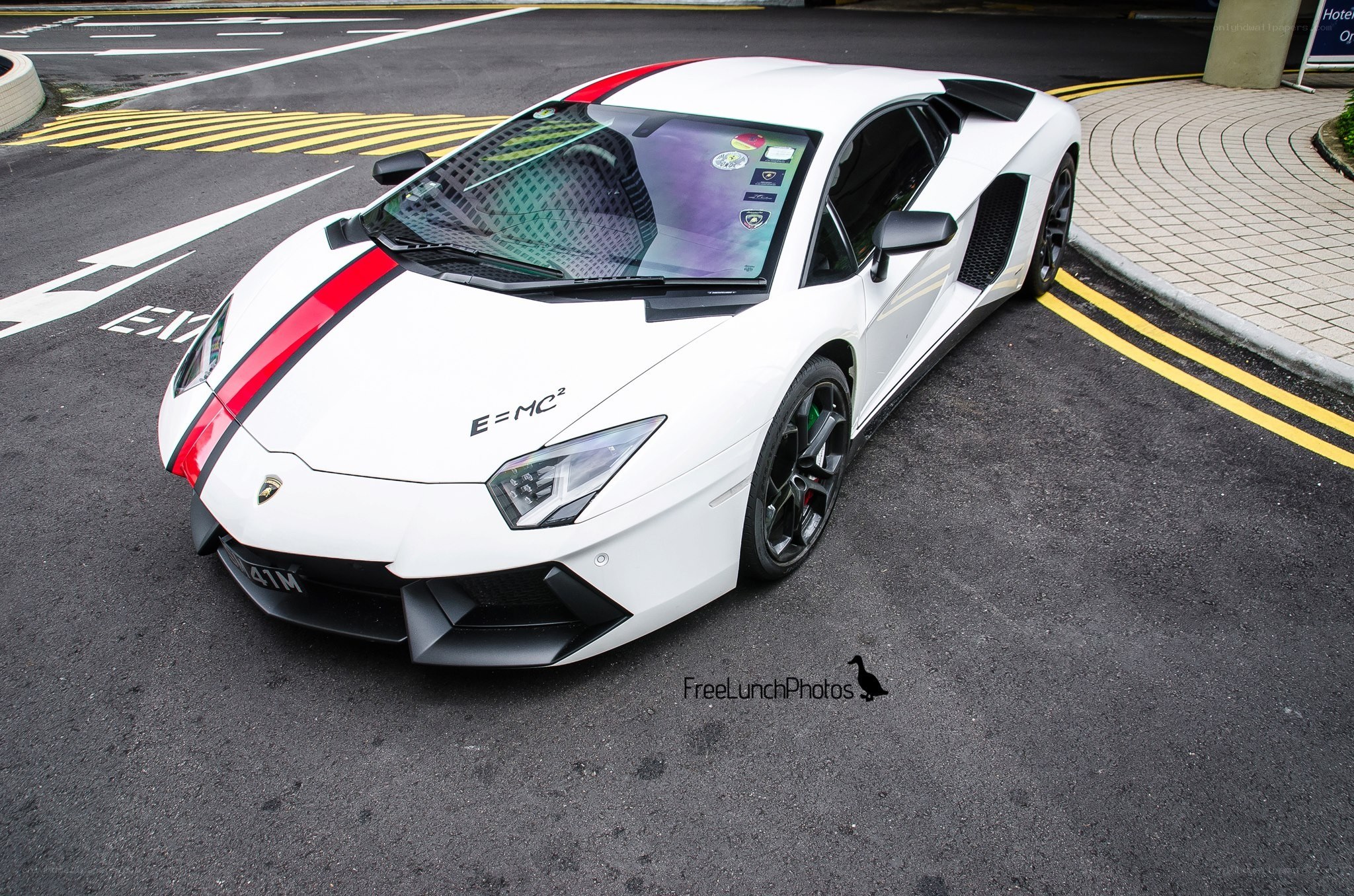 White Lamborghini with red stripes
