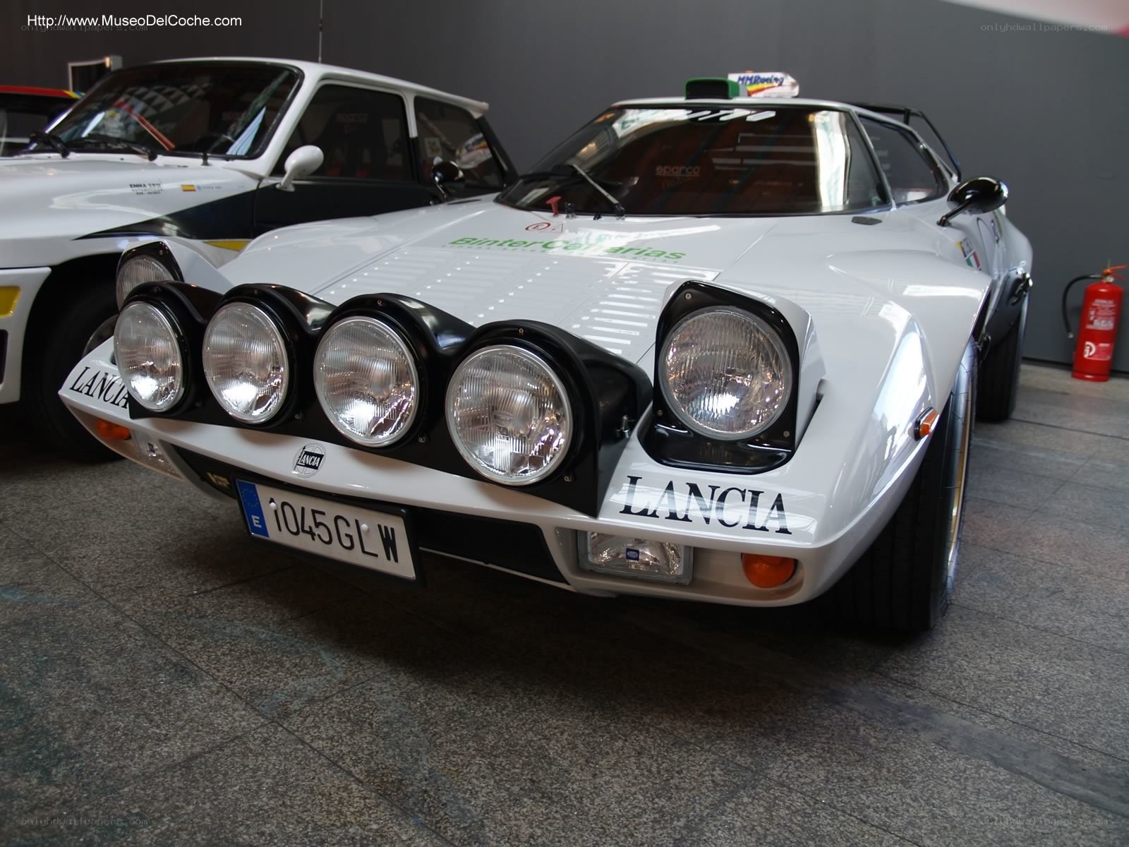 White Lancia rally car