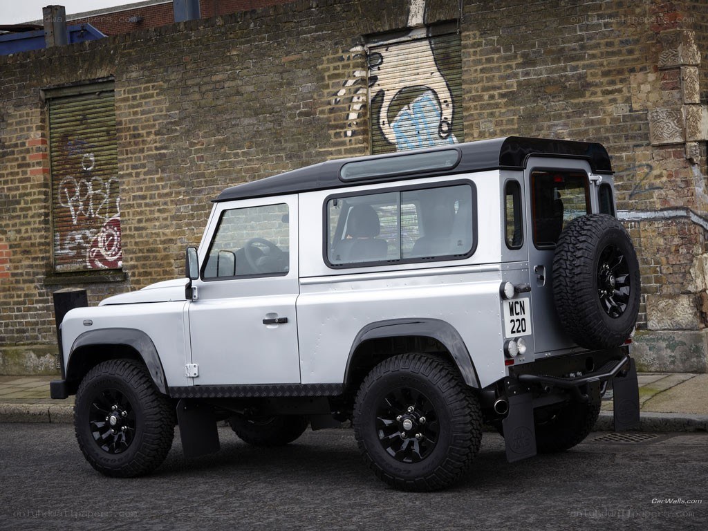 white land rover defender