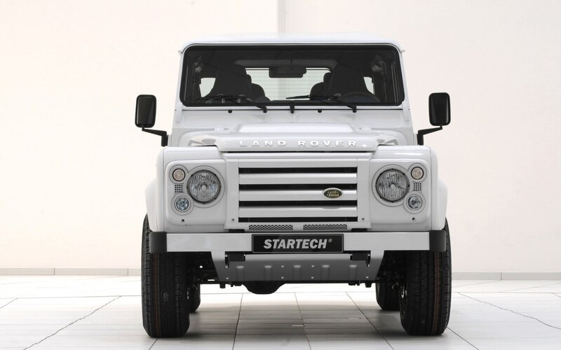 white land rover defender