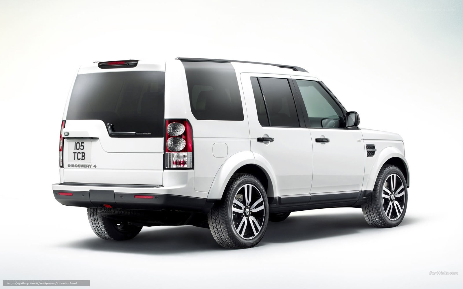 white land rover discovery