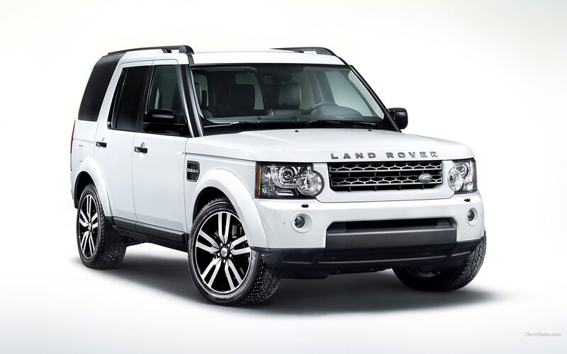 white land rover discovery