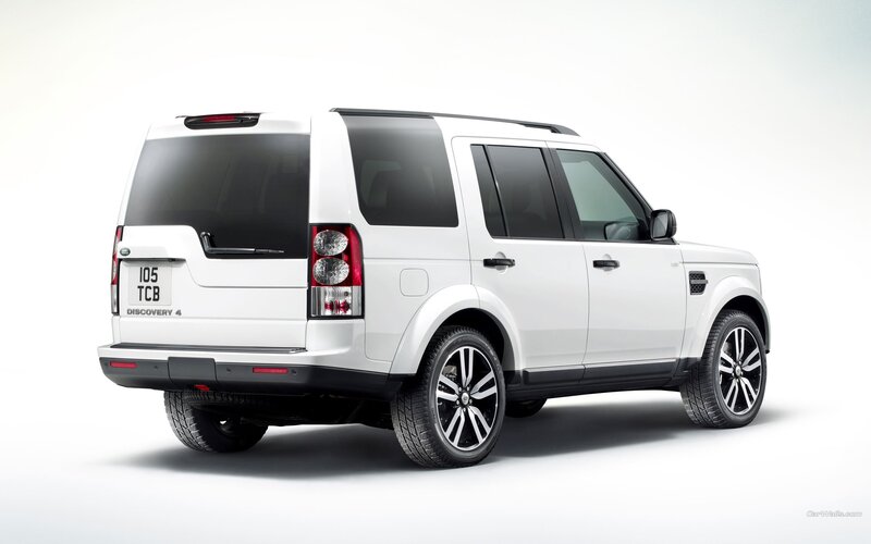 white land rover discovery