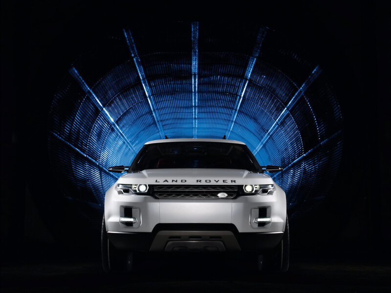 White Land Rover in blue tunnel