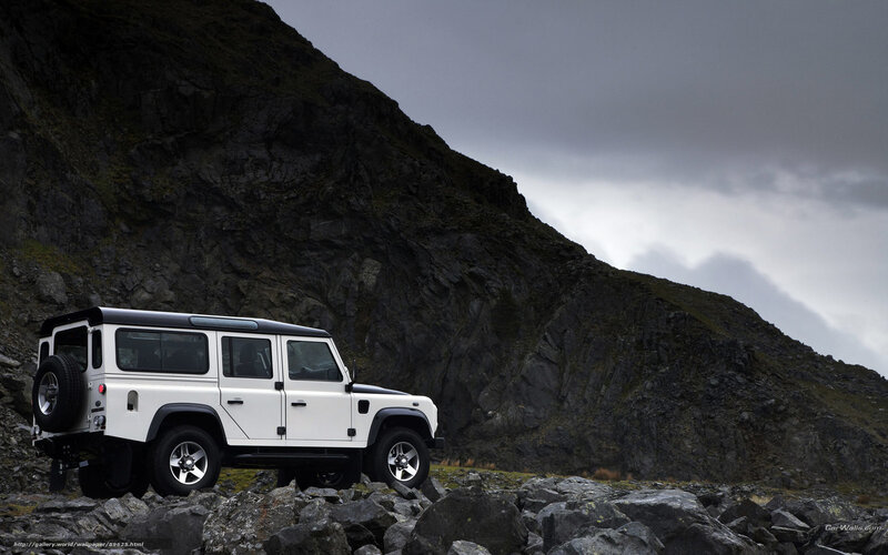 White Land Rover in Mountains