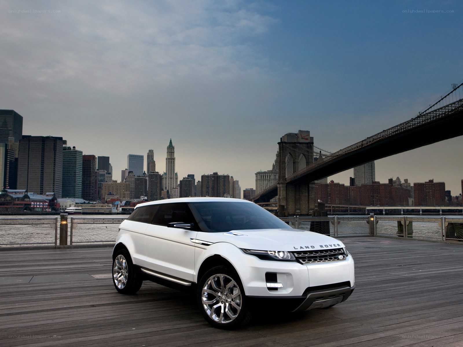 White Land Rover on a pier