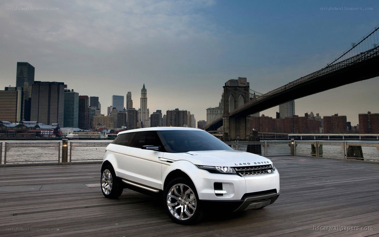 White Land Rover on a pier