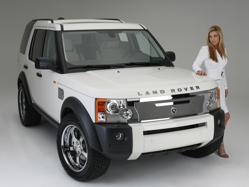 White Land Rover with model
