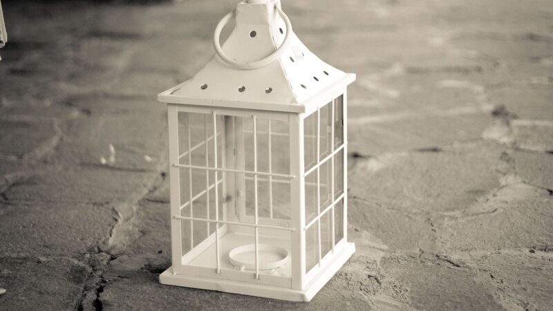 white lantern on stone