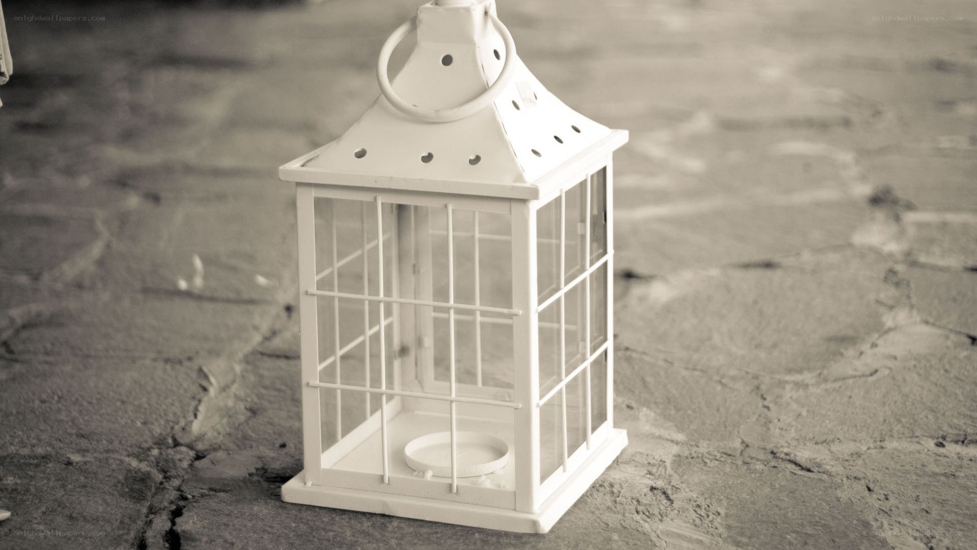 white lantern on stone