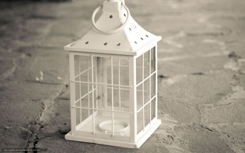 white lantern on stone
