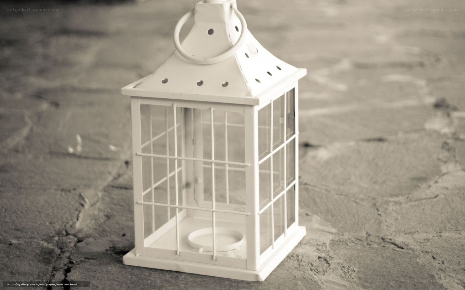 white lantern on stone