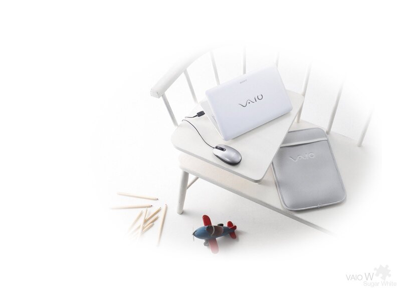 White Laptop on Chair