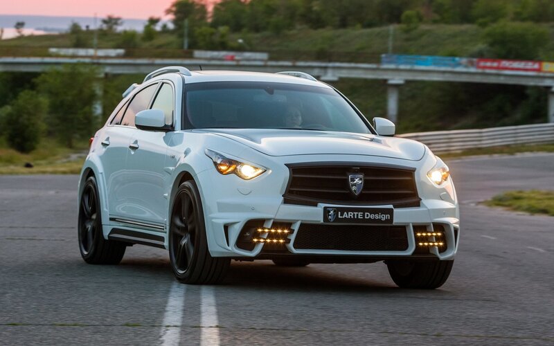 White Larte Design SUV on track