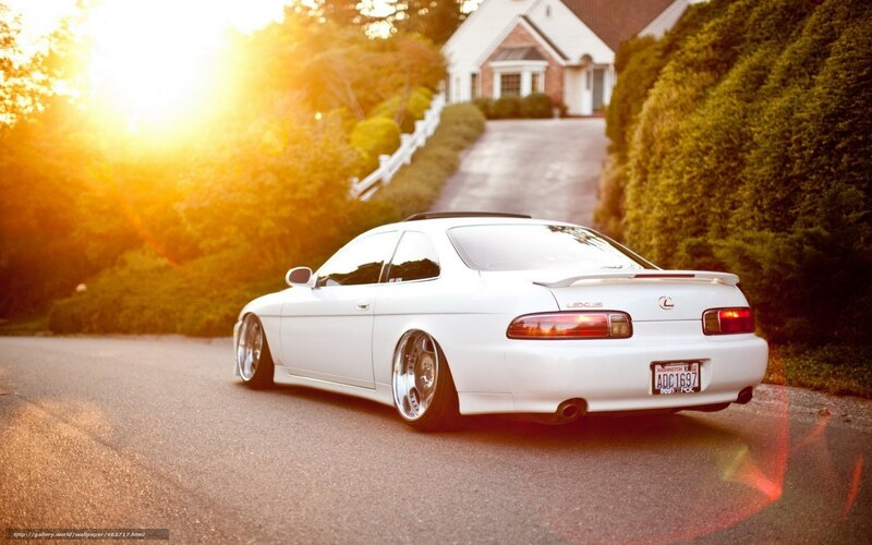 white lexus at sunset
