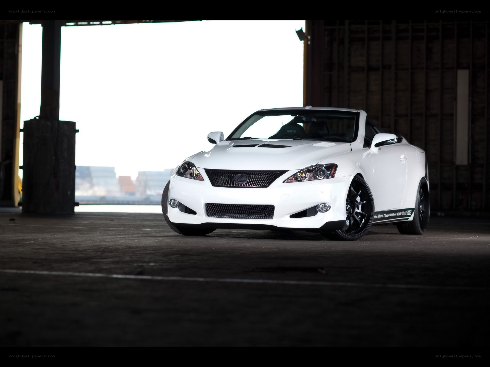 White Lexus convertible in warehouse