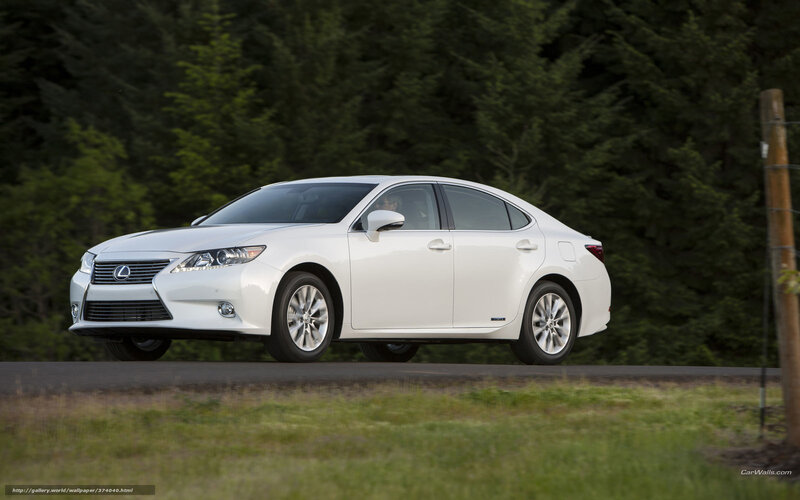 White Lexus ES driving on road