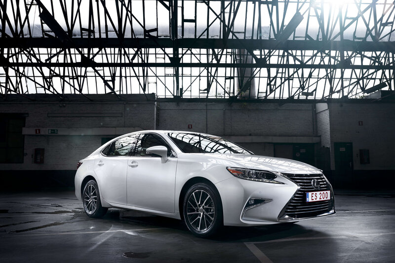 White Lexus ES in industrial setting
