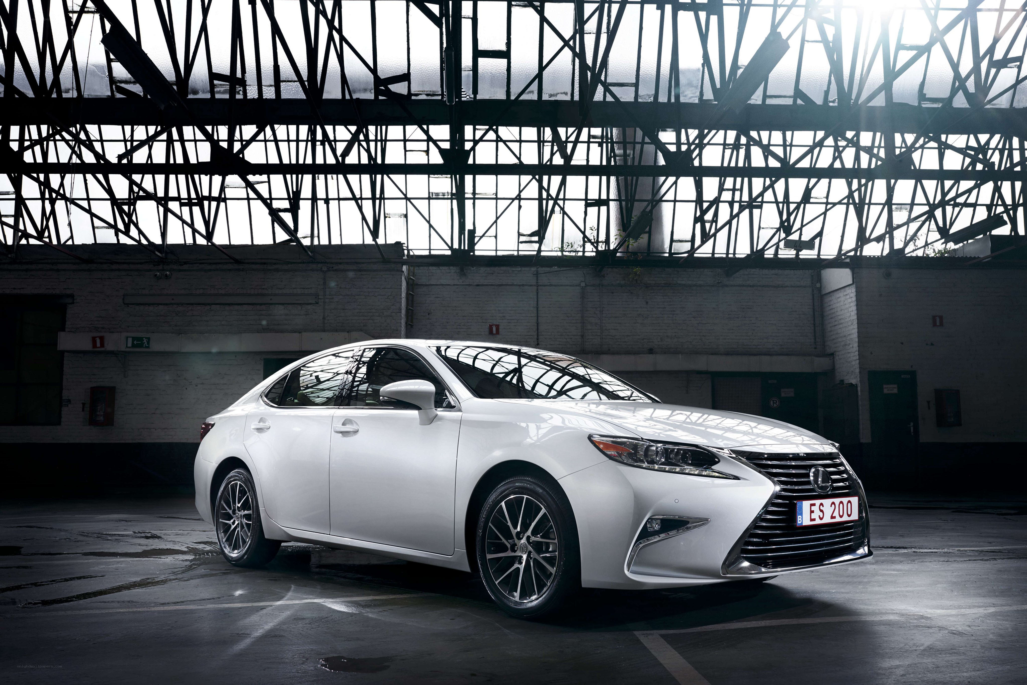 White Lexus ES in industrial setting